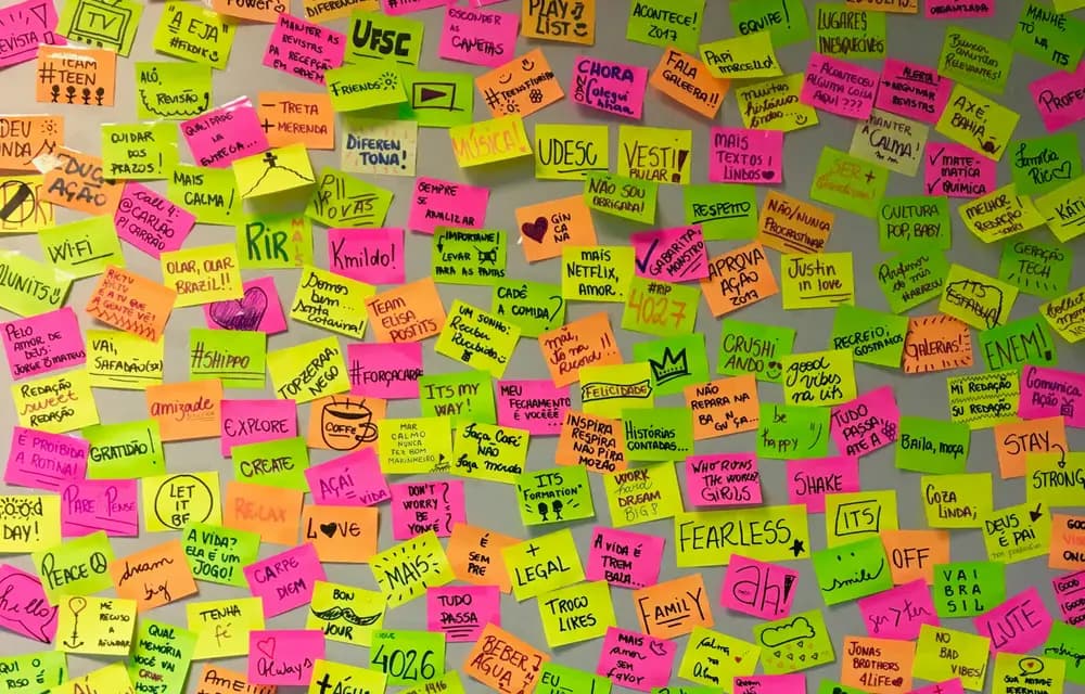 Colourful sticky notes arranged on a wall during a planning session