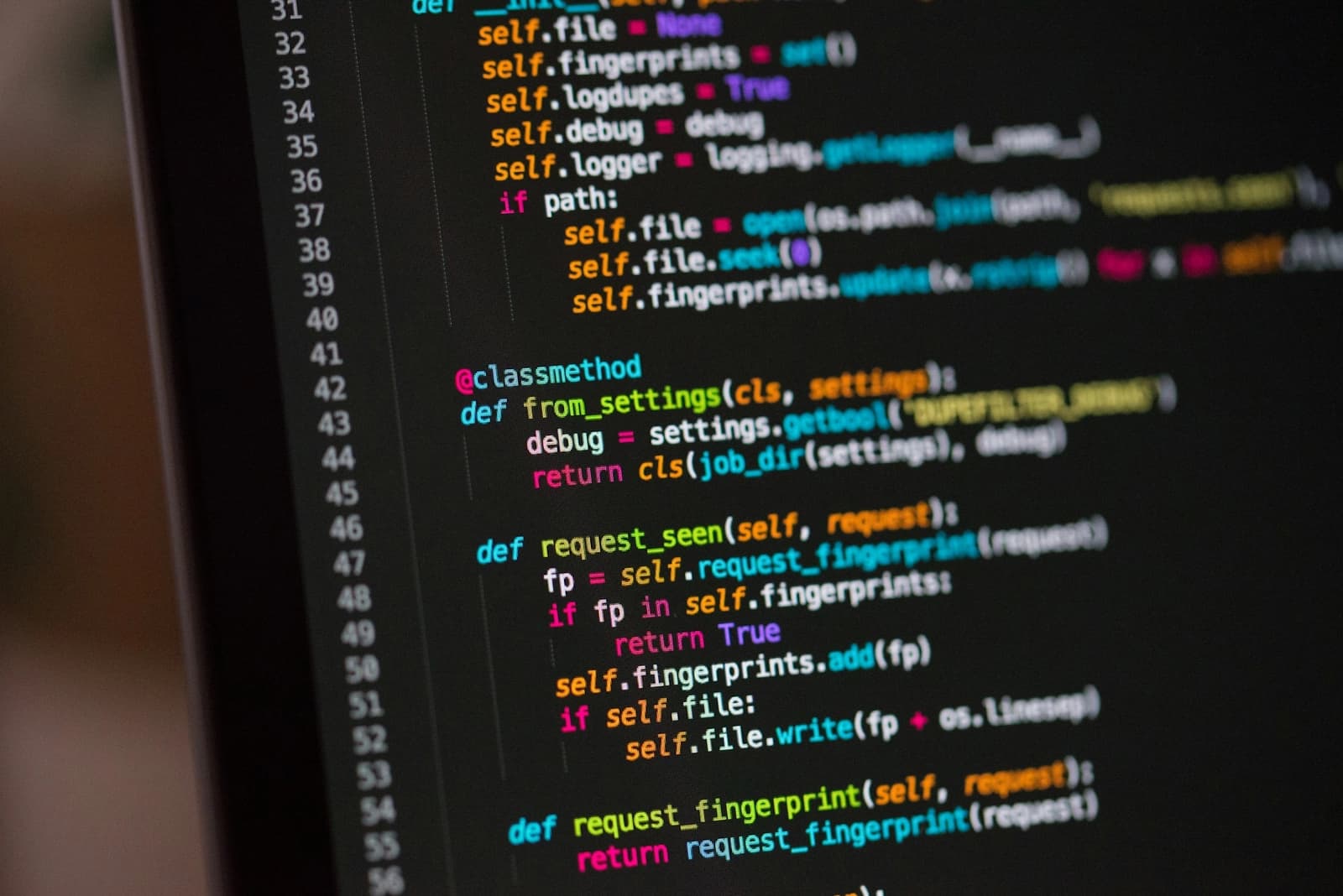 Code on a dark screen in a code editor